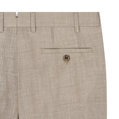Close-up of the back of Berwich Beige Wool Silk Linen Loro Piana Casual Trouser, showing a single welt pocket with button, belt loop above, and a refined woven texture for sophisticated style. , available at Richard Gelding Mayfair