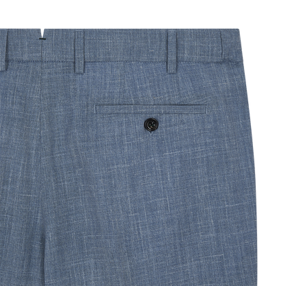 Close-up of the upper section of Berwich Azure Blue Wool Silk Linen Loro Piana Casual Trouser, showing belt loops, a buttoned back pocket, and visible weave. Waistband and pocket details highlight signature Loro Piana tailoring. , available at Richard Gelding Mayfair