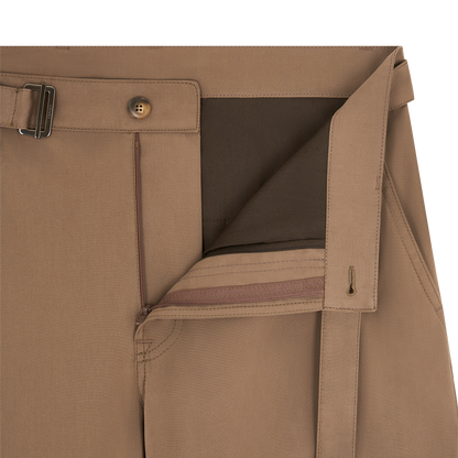 Close-up of Canali Brown Cotton Poplin Self-Belt Trouser, featuring an extended waistband tab with buckle, tan button closure, partially open zipper fly, and tailored dark brown inner waistband with neat stitching and fabric detailing. , available at Richard Gelding Mayfair