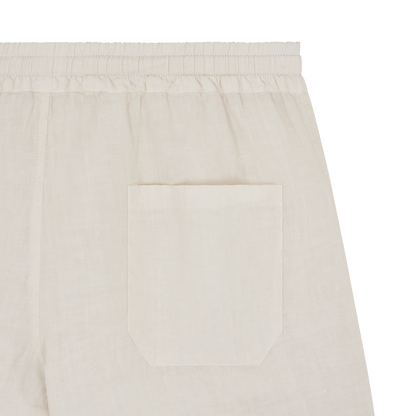 Close-up of the back of Fedeli Off White Linen Drawstring Trousers, made from lightweight fabric with an elastic waistband and a single rectangular back pocket. Visible stitching details. Plain white background. , available at Richard Gelding Mayfair