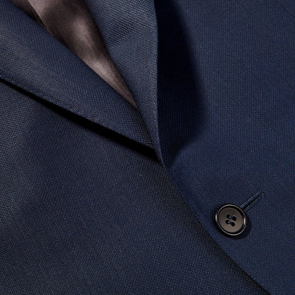 A close up image of the Canali Blue Wool Hopsack Travel Blazer featuring natural stretch.