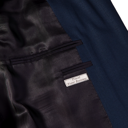 A close up of a Canali Blue Wool Hopsack Travel Blazer, which is wrinkle-resistant and stain repellent.