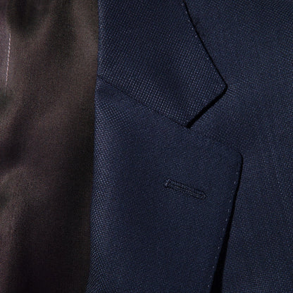 A close up image of a Canali Blue Wool Hopsack Travel Blazer.