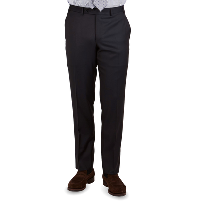 A man wearing a Canali Navy Blue Wool Notch Lapel Suit.