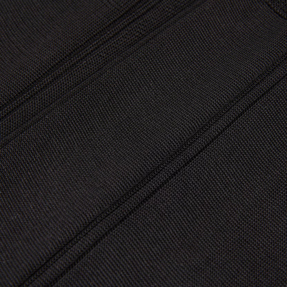 A close up image of a Canali black suitcase with pure silk lining.