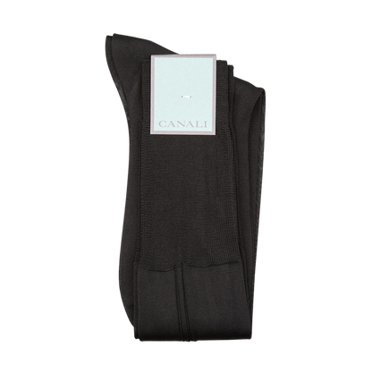 A pair of black Canali Black Knee Length Silk Dress Socks on a white background.