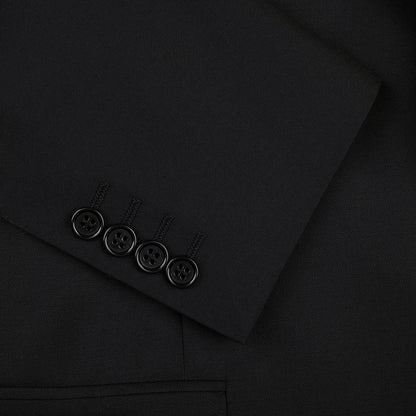 A classic, timeless close up of a Canali Black Virgin Wool Twill Suit with buttons.