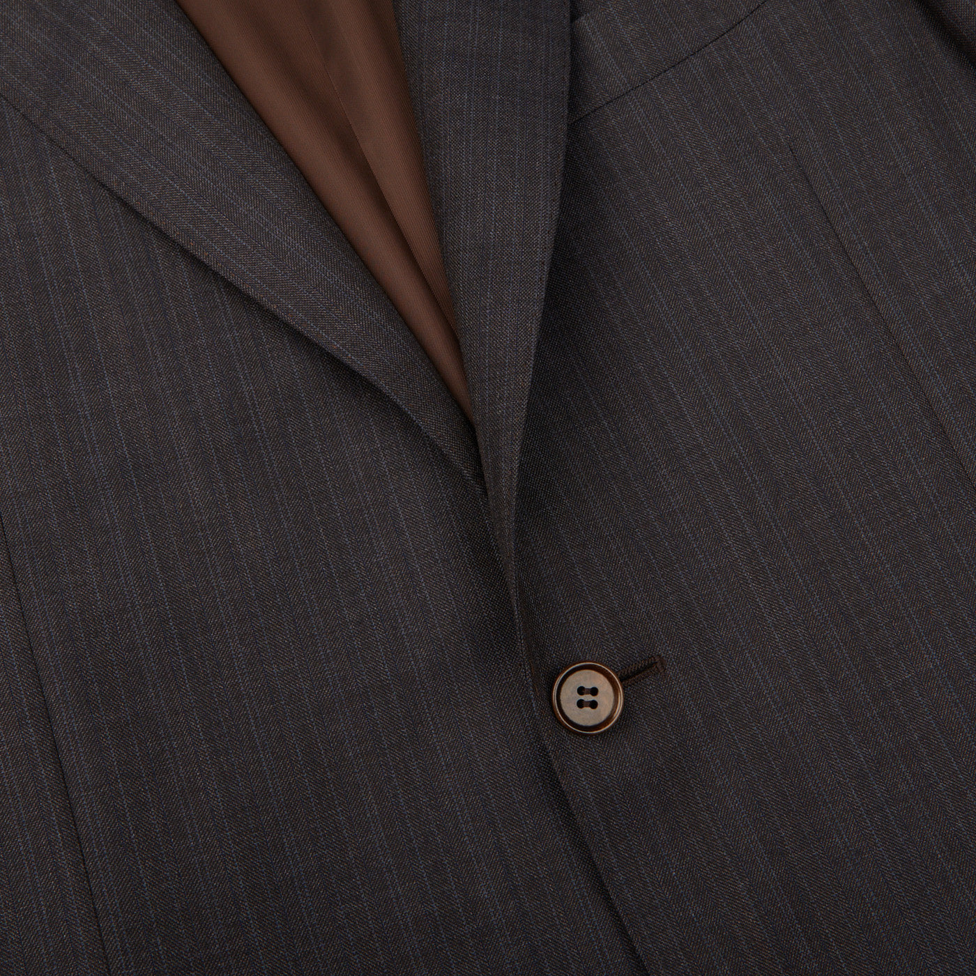 A close up of a Canali Blue Brown Melange Striped Wool Suit with brown buttons made of virgin wool.