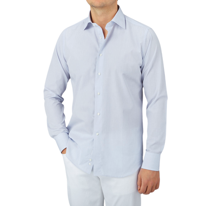 A man wearing a Canali Blue Mini-Check Cotton Single Cuff Shirt.
