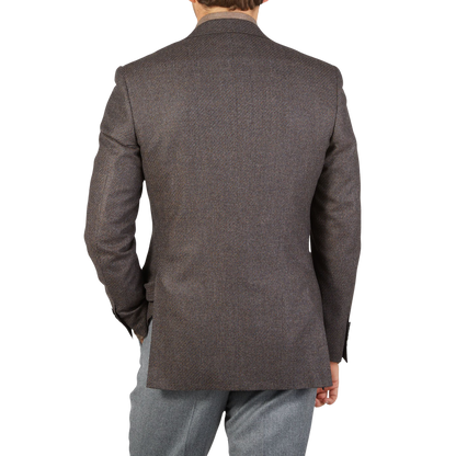 The back view of a man wearing a Canali Brown Grey Zig Zag Wool Drop 6 Blazer.
