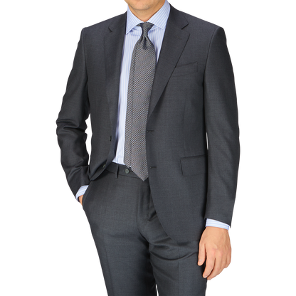 A man in a Canali Charcoal Grey Wool Notch Lapel Suit looks timeless and formal.