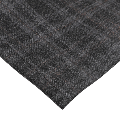 Close-up of the Dark Grey Checked Wool Silk Drop 6 Blazer by Canali, featuring a Milanese-style dark gray and light gray plaid fabric with a textured surface, displayed on a flat white background.