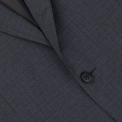 Close-up of a Canali Grey-Blue Melange Wool Suit jacket focusing on the texture, lapel, and a button.