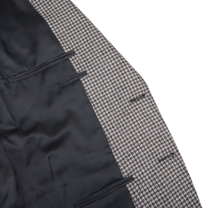 A close up of a Canali Grey Houndstooth Wool Drop 6 Blazer.