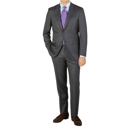 A man wearing a Canali Grey Melange Wool Flannel Suit.