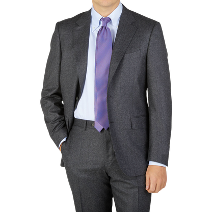 A man in a Canali Grey Melange Wool Flannel Suit.
