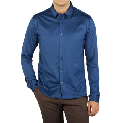 A contemporary man wearing a Canali Indigo Blue Cotton Jersey Casual Shirt.