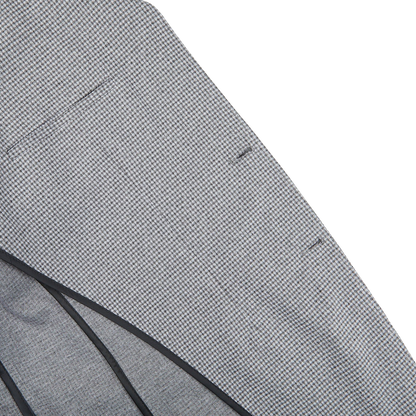 A close up of a Canali Light Grey Houndstooth Cotton Jersey Blazer.