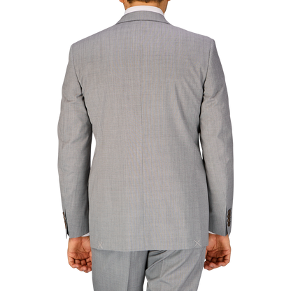 A man seen from behind wearing a Canali Light Grey Micro Check Wool Suit.