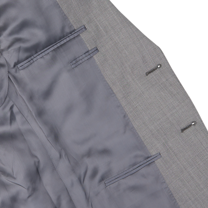 Close-up of a Canali Light Grey Micro Check Wool Suit jacket with pocket details.