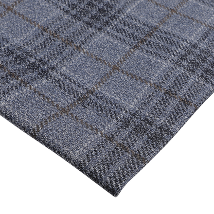 Close-up of the Canali Mid Blue Checked Wool Silk Drop 6 Blazer, reminiscent of the Milanese house style, showcasing its intricate texture and pattern.
