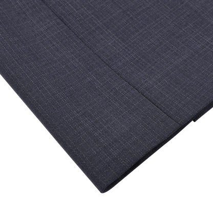 Close-up of a textured, woven pattern on the Navy Blue Micro Design Wool Suit by Canali, capturing sartorial elegance on a white background.