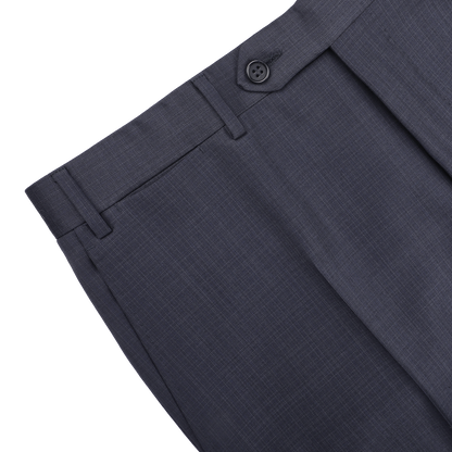 The Canali Navy Blue Micro Design Wool Suit, featuring a button and belt loops for classic sartorial elegance, is highlighted against a black background.