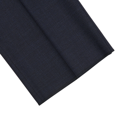 A close up of a Canali Navy Puppytooth Wool Stretch Flat Front Trousers.