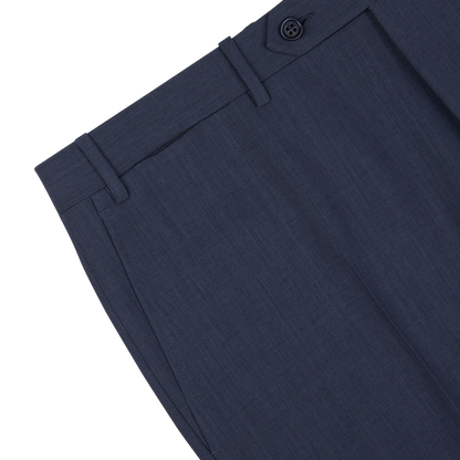 Close-up of a slate blue semi-plain wool Canali dress pants waistband with button closure.