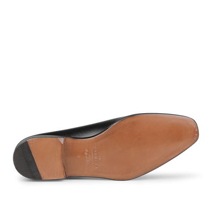 Bottom view of the Black Calf Leather Wholecut Rain Oxford Shoes, highlighting Carmina's refined craftsmanship with a brown sole and heel constructed using Goodyear welted techniques.