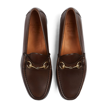 A pair of Brown Funchal Leather Xim Horsebit loafers, crafted by skilled craftsmen with metal horsebit detail, by Carmina.