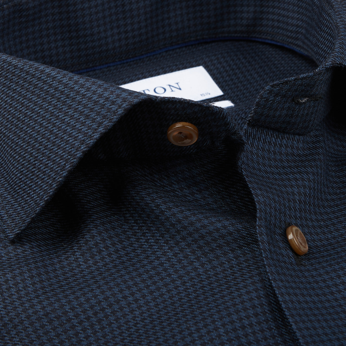 A close up of an Eton Blue Puppystooth Merino Wool Contemporary Shirt.
