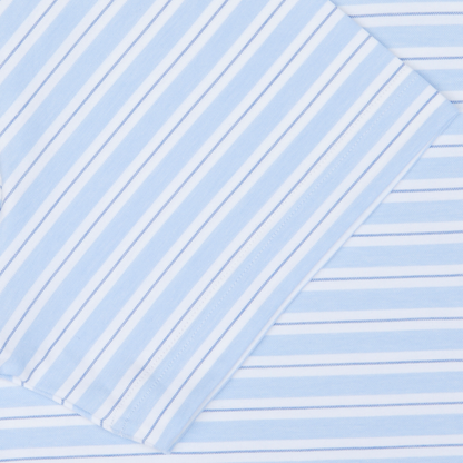 Blue and white striped Fedeli cotton-nylon blend fabric arranged diagonally with a folded edge visible.