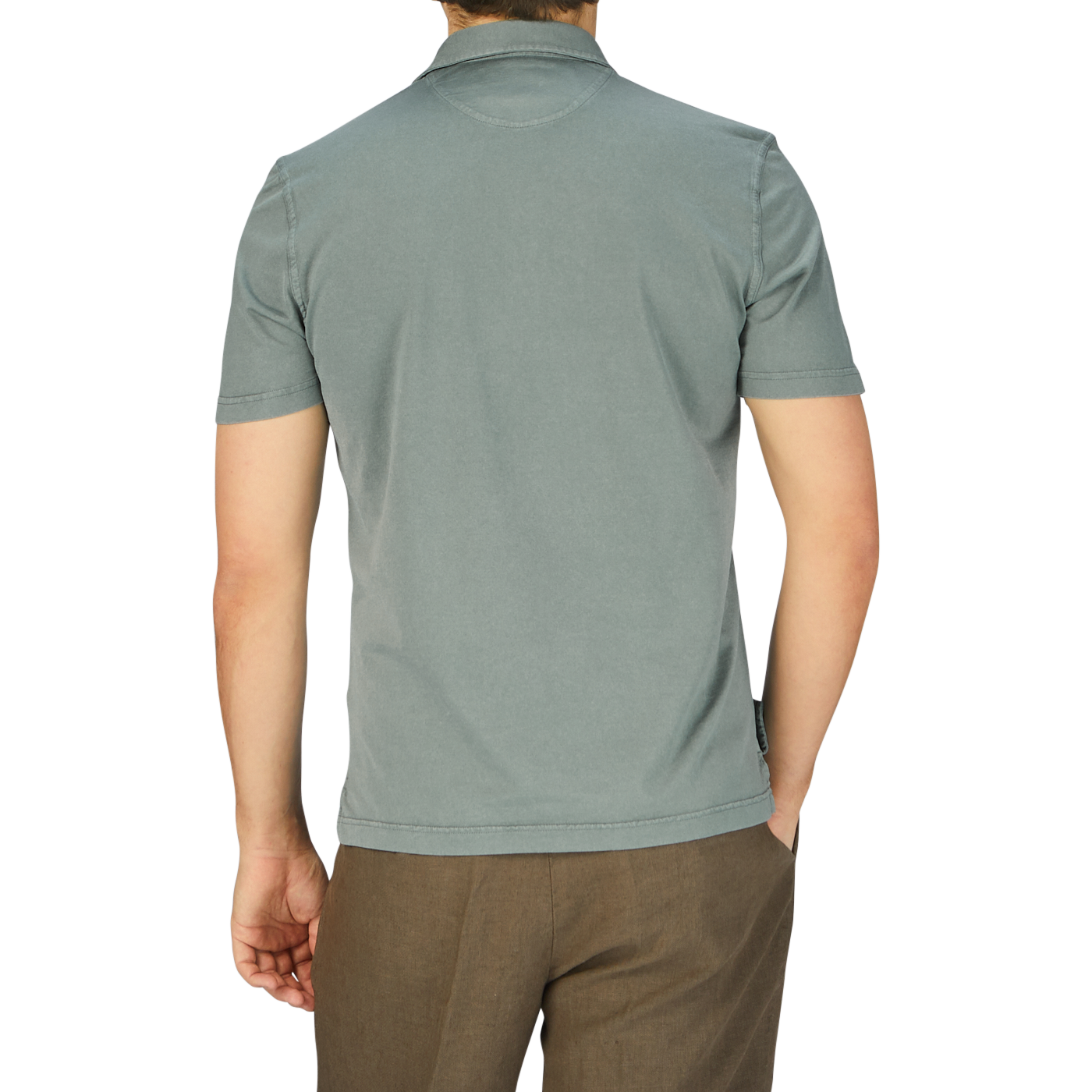 The back view of a man wearing a Fedeli Olive Green Organic Cotton Polo Shirt.