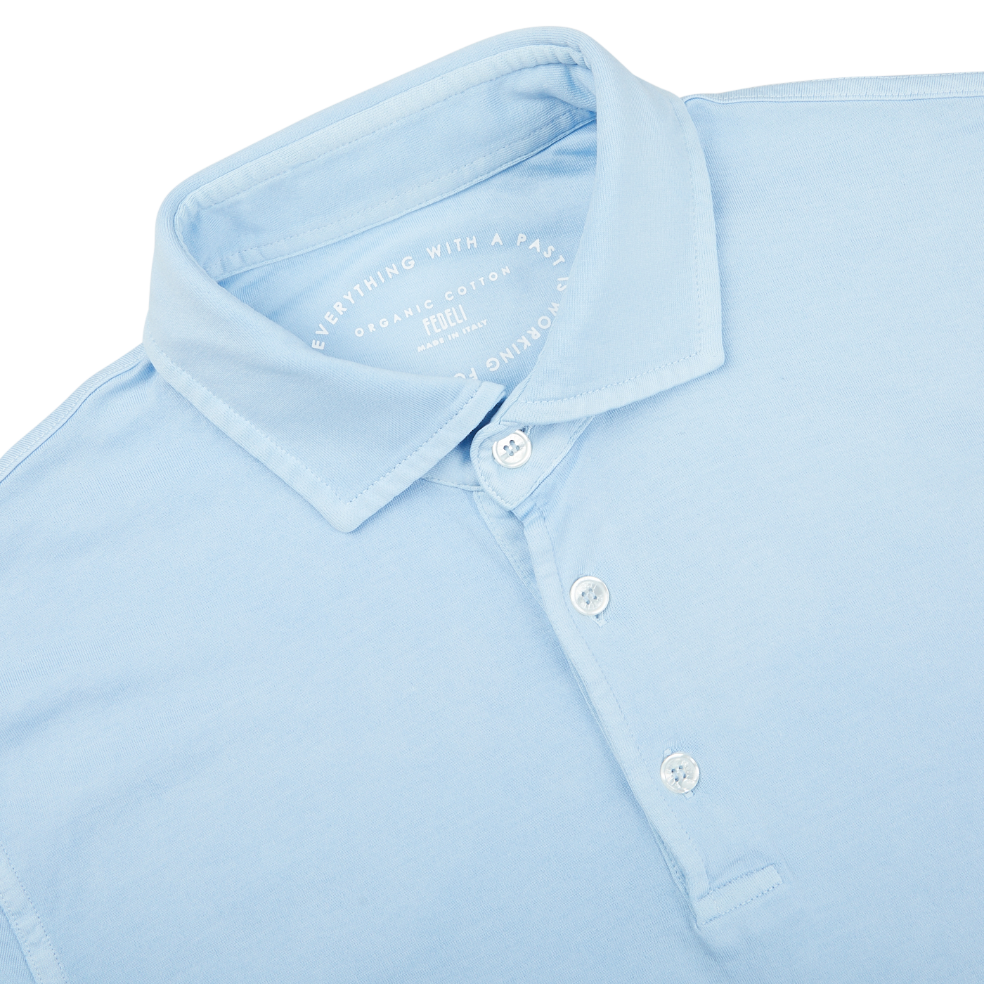 A close up of a Fedeli Sky Blue Organic Cotton Polo Shirt.