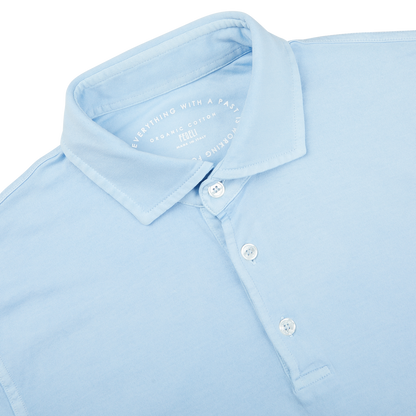 A close up of a Fedeli Sky Blue Organic Cotton Polo Shirt.