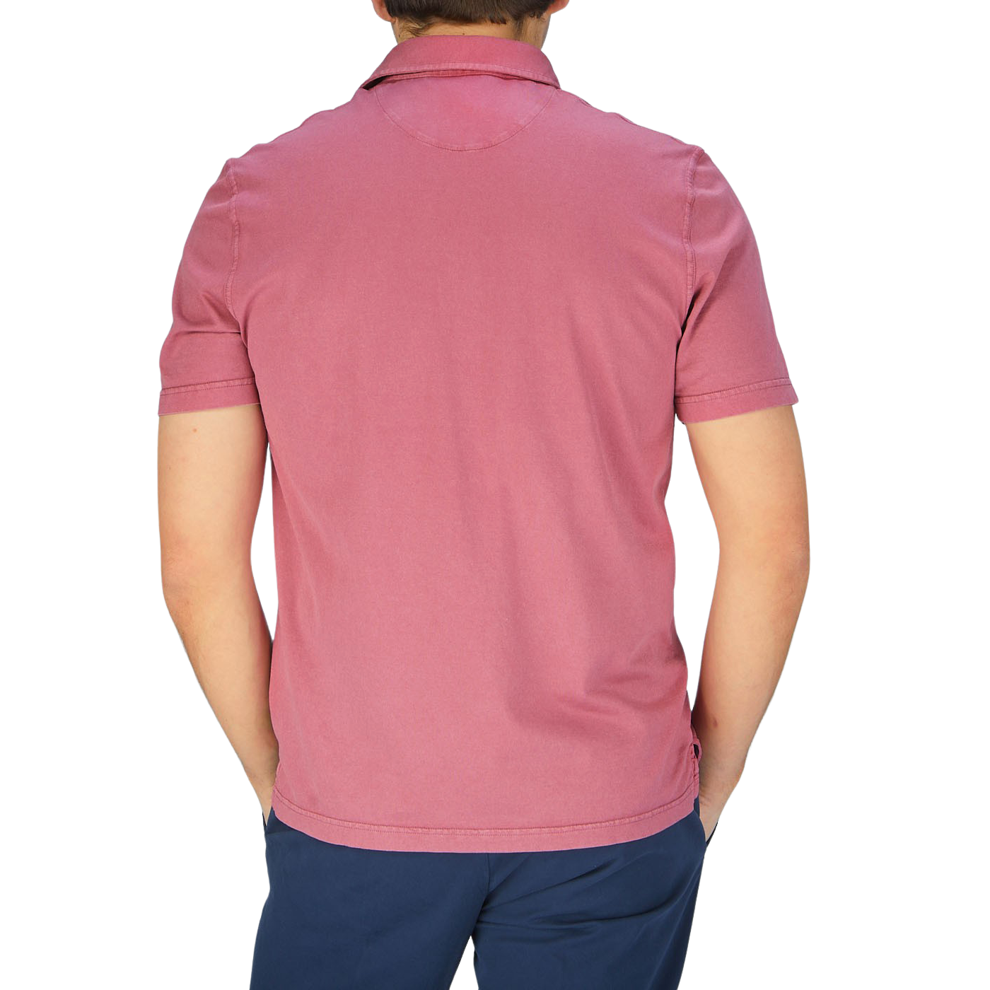 The back view of a man wearing a Fedeli Washed Raspberry Organic Cotton Polo Shirt.