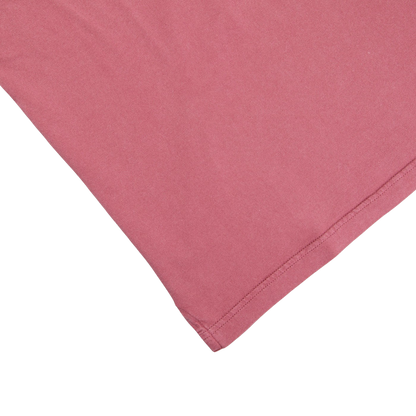 A Fedeli Washed Raspberry Organic Cotton Polo Shirt on a white surface.
