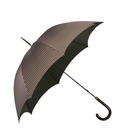 A Green Red Striped Maple Handle Umbrella from Fox Umbrellas is open and resting on the ground against a plain background.