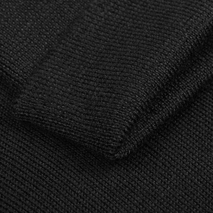 Close-up of the Gran Sasso Black Extra Fine Merino Wool Rollneck, highlighting the detailed knit texture and neatly finished edge—perfect for a refined, slim fit look.