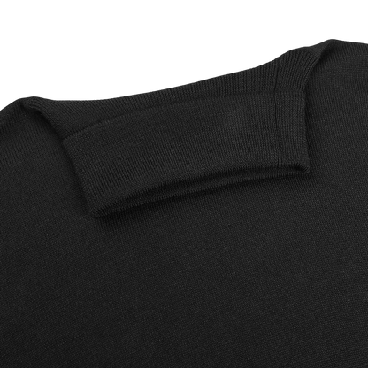 Close-up of the collar and upper back of the Gran Sasso Black Extra Fine Merino Wool Rollneck, highlighting the ribbed texture, stitching details, and slim fit design.
