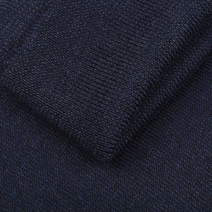 Close-up of Gran Sasso's Navy Blue Extra Fine Merino Wool Rollneck, highlighting the fine knit texture—perfect for a slim fit and crafted from premium thin wool.