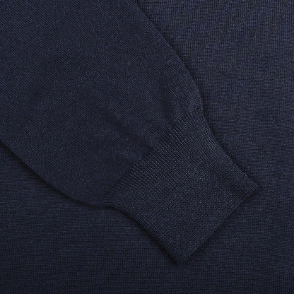 Close-up of the Gran Sasso Navy Blue Extra Fine Merino Wool Rollneck, highlighting the ribbed cuff and textured fabric of this slim fit sweater.