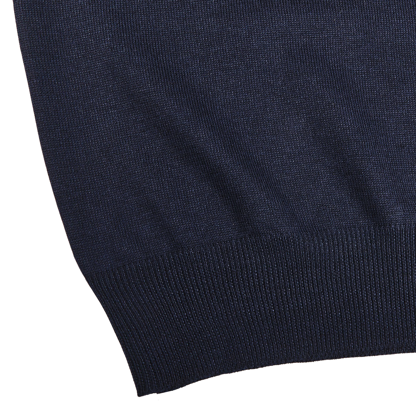 Close-up of the lower part of the Gran Sasso Navy Blue Extra Fine Merino Wool Rollneck, showcasing its slim fit and ribbed hem detail against a white background.