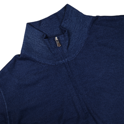 A close-up of a Blue Melange Vintage Merino Wool Zip Cardigan with a zipped collar, made by Gran Sasso.