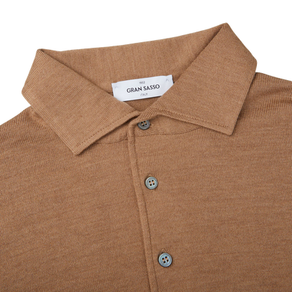 A Gran Sasso Camel Merino Wool One-Piece Collar polo shirt with buttons on the collar.