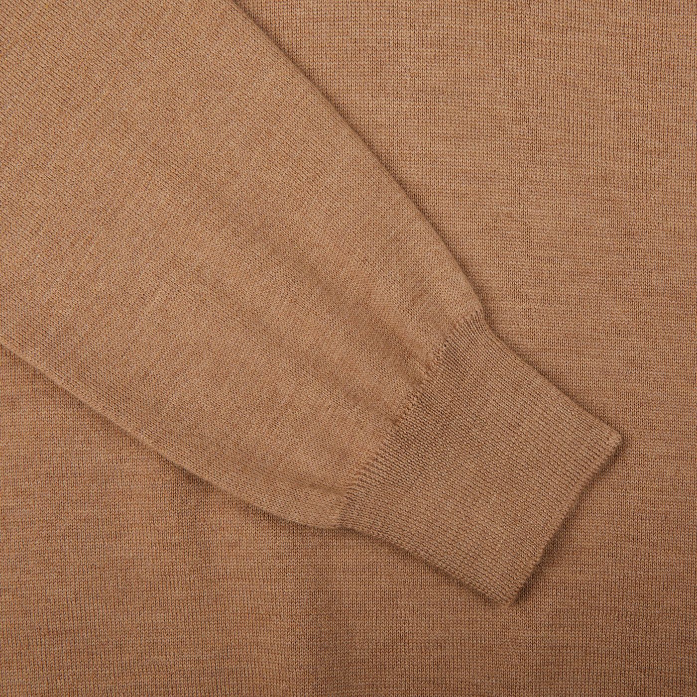 A close up of a Gran Sasso Camel Merino Wool One-Piece Collar polo shirt.