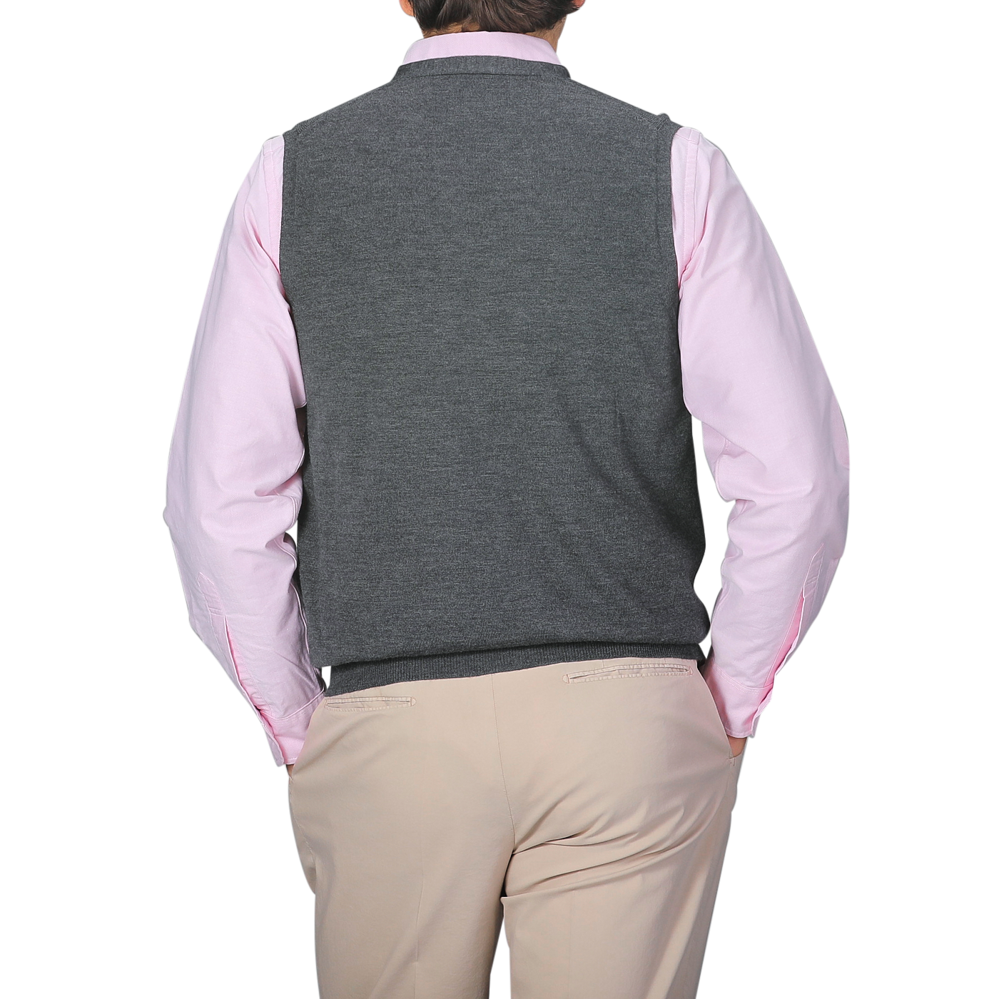 A person is shown from the back wearing a light pink shirt, beige pants, and the Gran Sasso Charcoal Extra Fine Merino Wool Vest against a plain gray background.