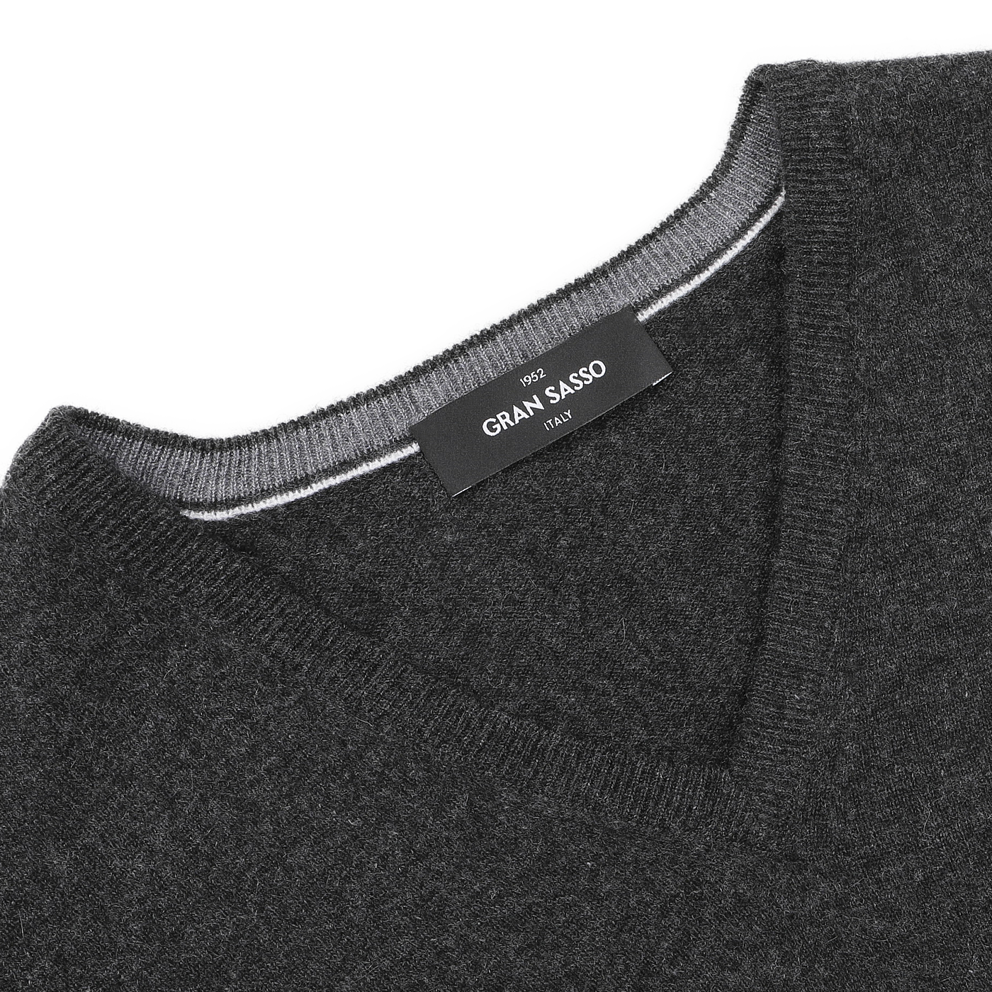 The Charcoal Grey Cashmere V-Neck Sweater by Gran Sasso is crafted from pure cashmere fibers, offering the elegance and luxurious feel of sustainable knitwear.