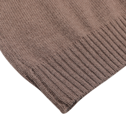 Close-up of the Gran Sasso Fawn Brown Air Wool Rollneck, highlighting its intricate knitted fabric and ribbed edge.